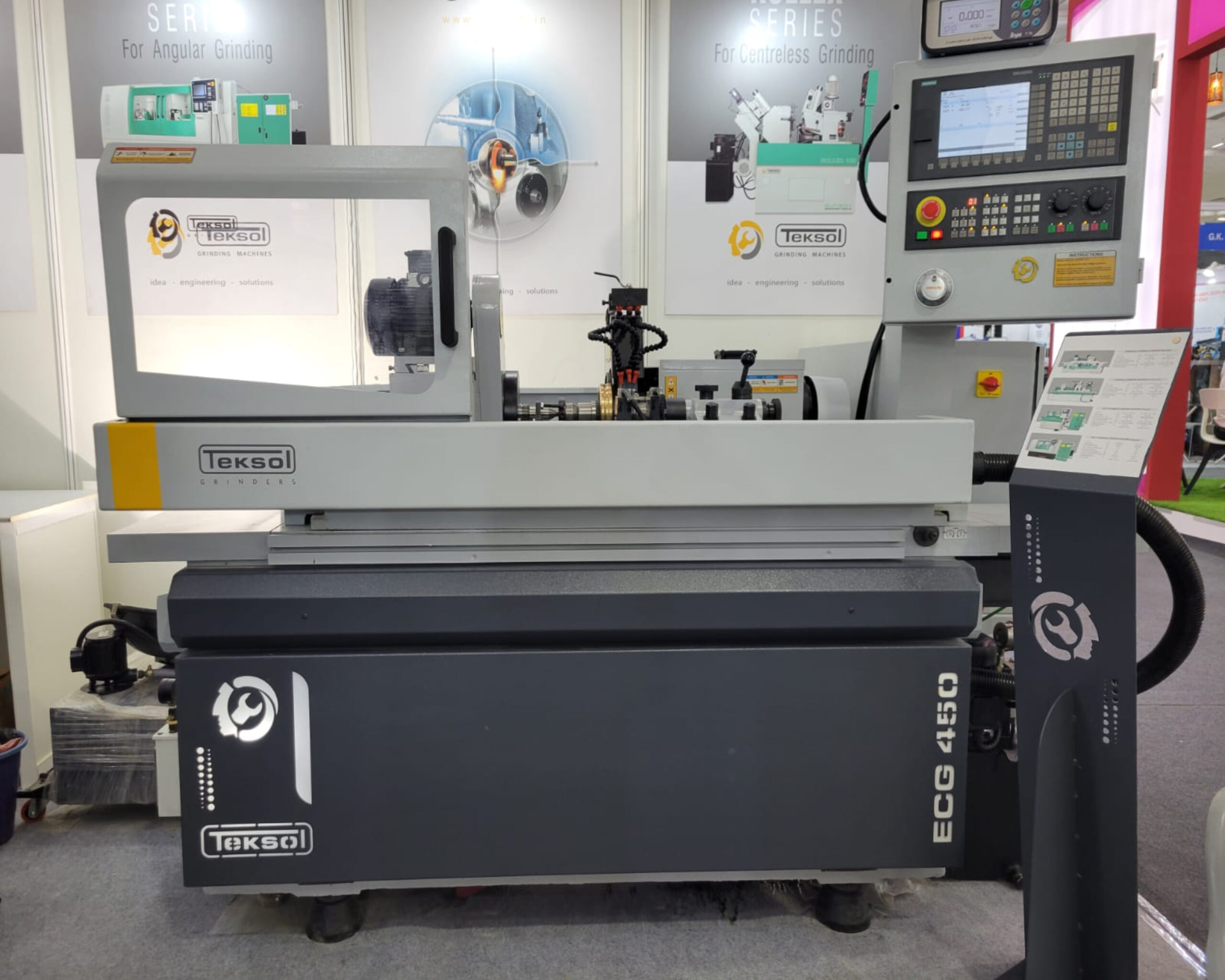 CNC Cylindrical Grinding Machine displayed with demo in progress